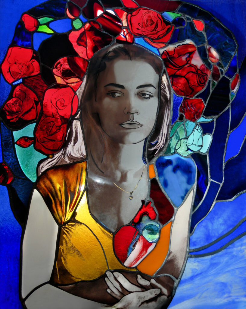 Stained glass contemporary portrait of Aleksandra Puzyn with red roses surrounding her head, an anatomical heart on her chest made from jewel glass, and hands in an embracing gesture. The cobalt blue glass in the background, and underneath, is a realistic painting of a greyhound.
